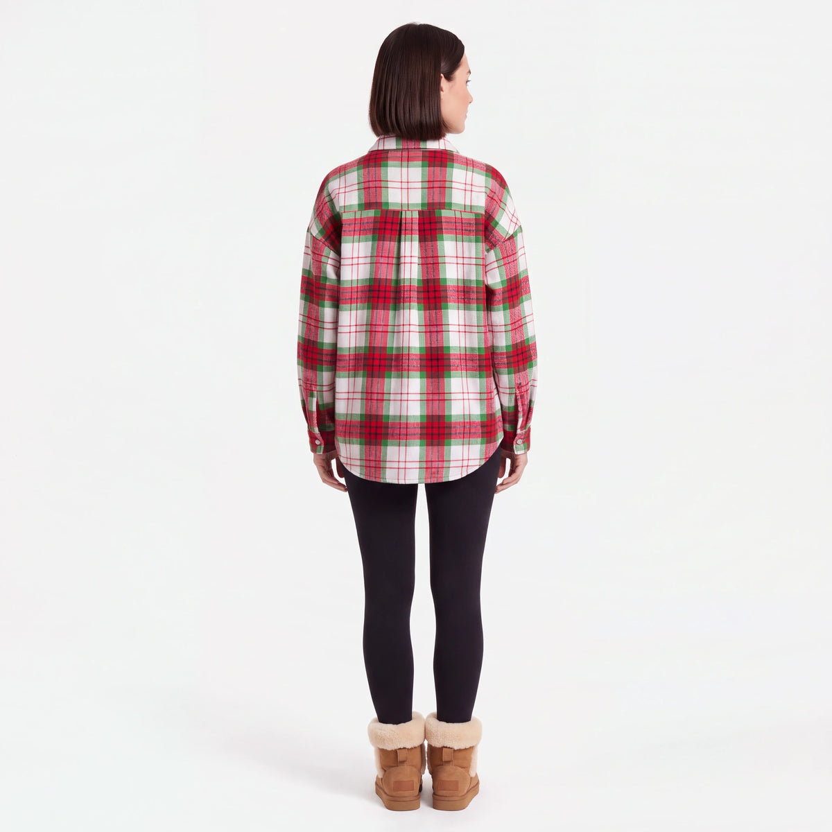 Back view: the curved hem of the Red Plaid shacket covers the backside over leggings