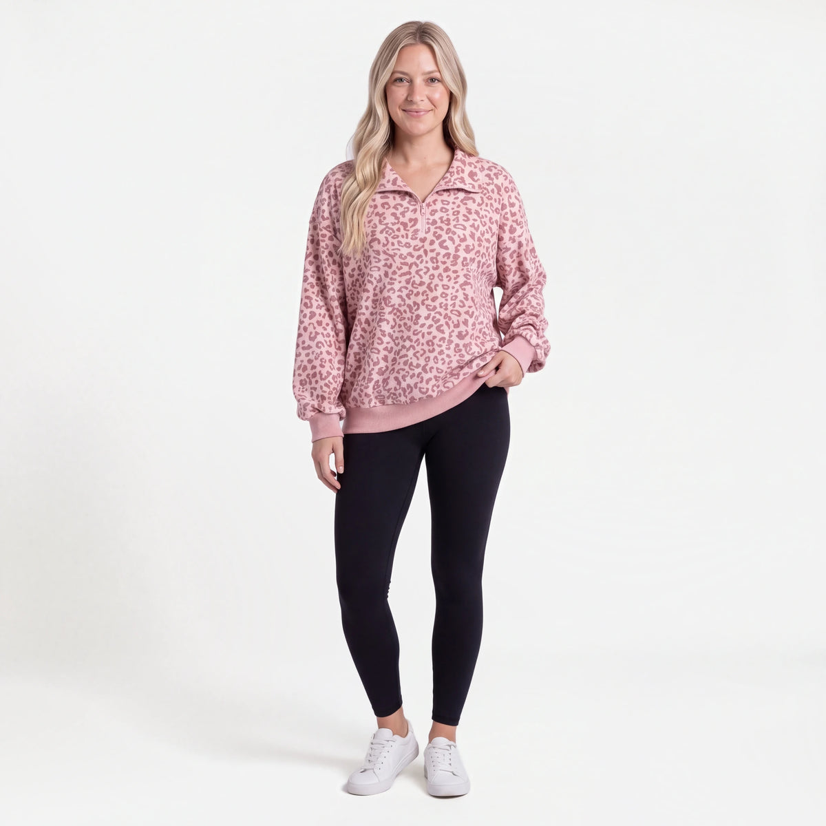 Woman wearing the Pink Leopard quarter zip